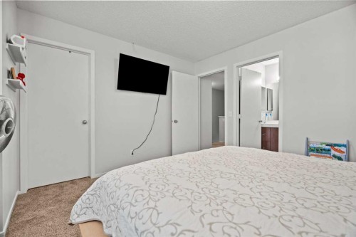 179 Copperstone Cove Se, Calgary, AB - Indoor Photo Showing Bedroom