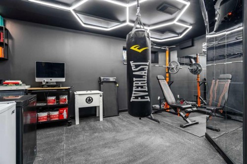 179 Copperstone Cove Se, Calgary, AB - Indoor Photo Showing Gym Room