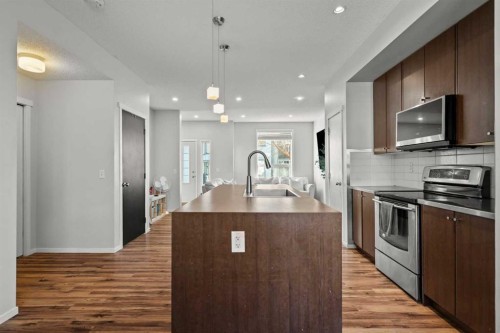 179 Copperstone Cove Se, Calgary, AB - Indoor Photo Showing Kitchen With Upgraded Kitchen