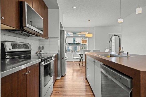 179 Copperstone Cove Se, Calgary, AB - Indoor Photo Showing Kitchen With Double Sink With Upgraded Kitchen