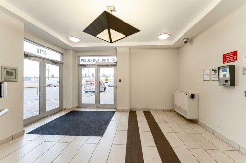 109-8710 Horton Road Sw, Calgary, AB - Indoor Photo Showing Other Room