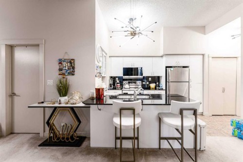 109-8710 Horton Road Sw, Calgary, AB - Indoor Photo Showing Other Room