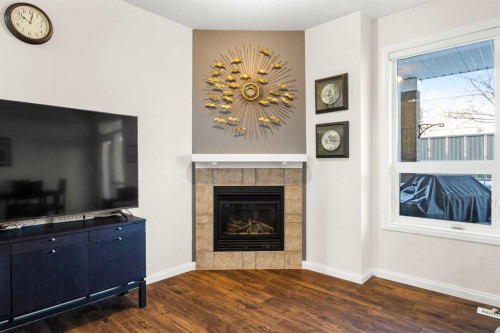 156 Royal Manor Nw, Calgary, AB - Indoor Photo Showing Living Room With Fireplace