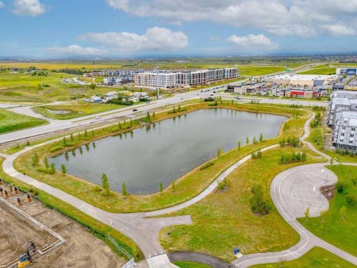 450-65 Belvedere Point Se, Calgary, AB - Outdoor With Body Of Water With View