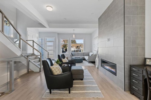 2419 22 Street Nw, Calgary, AB - Indoor Photo Showing Living Room With Fireplace