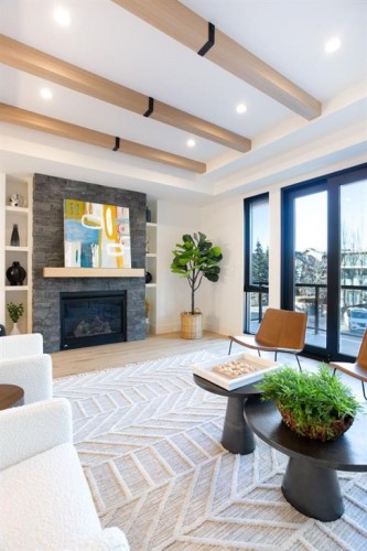 3(Nw)-617 4Th Street, Canmore, AB - Indoor Photo Showing Living Room With Fireplace