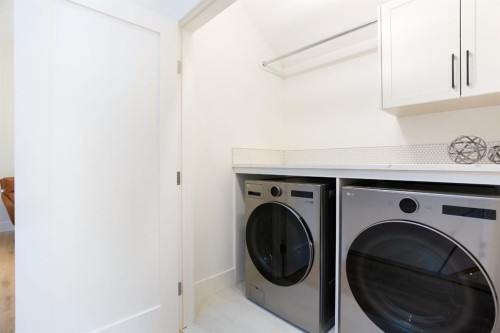 3(Nw)-617 4Th Street, Canmore, AB - Indoor Photo Showing Laundry Room