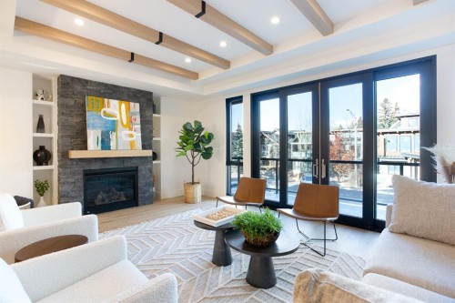 3(Nw)-617 4Th Street, Canmore, AB - Indoor Photo Showing Living Room With Fireplace