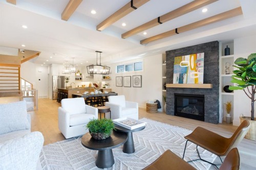 3(Nw)-617 4Th Street, Canmore, AB - Indoor Photo Showing Living Room With Fireplace