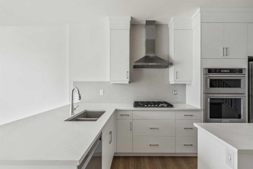 2515 Sovereign Crescent Sw, Calgary, AB - Indoor Photo Showing Kitchen With Double Sink With Upgraded Kitchen