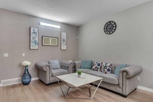 26 Corner Meadows Common Ne, Calgary, AB - Indoor Photo Showing Living Room