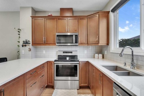 26 Corner Meadows Common Ne, Calgary, AB - Indoor Photo Showing Kitchen With Double Sink