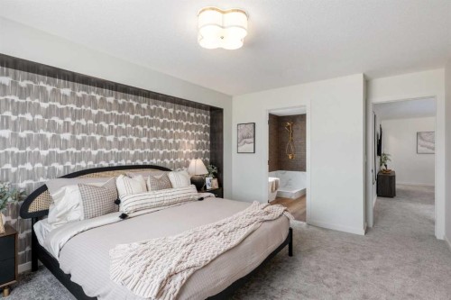 53 Royston Grove Nw, Calgary, AB - Indoor Photo Showing Bedroom