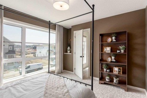 53 Royston Grove Nw, Calgary, AB - Indoor Photo Showing Bedroom