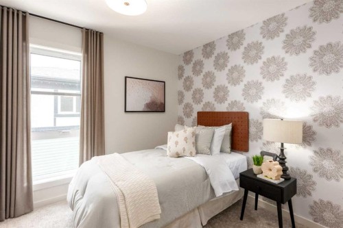53 Royston Grove Nw, Calgary, AB - Indoor Photo Showing Bedroom