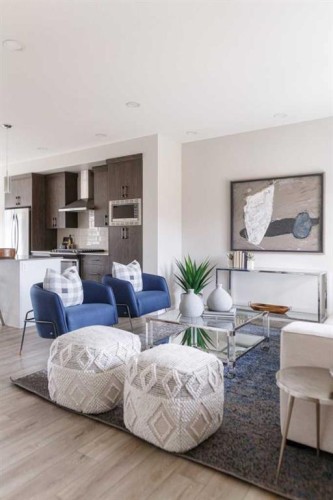 25 Sunrise Way, Cochrane, AB - Indoor Photo Showing Living Room