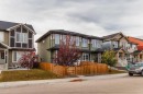 25 Sunrise Way, Cochrane, AB  - Outdoor With Facade 