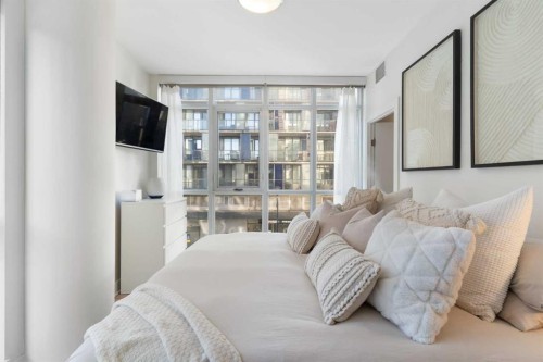 303-550 Riverfront Avenue Se, Calgary, AB - Indoor Photo Showing Bedroom