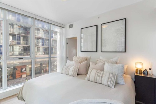 303-550 Riverfront Avenue Se, Calgary, AB - Indoor Photo Showing Bedroom