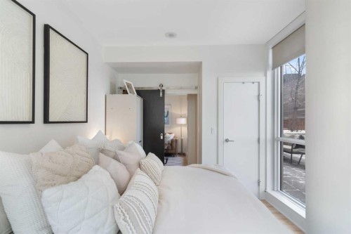 303-550 Riverfront Avenue Se, Calgary, AB - Indoor Photo Showing Bedroom