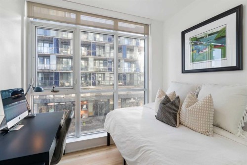 303-550 Riverfront Avenue Se, Calgary, AB - Indoor Photo Showing Bedroom