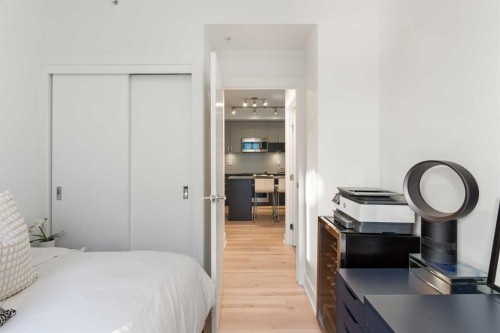 303-550 Riverfront Avenue Se, Calgary, AB - Indoor Photo Showing Bedroom