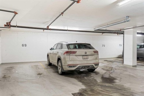 303-550 Riverfront Avenue Se, Calgary, AB - Indoor Photo Showing Garage