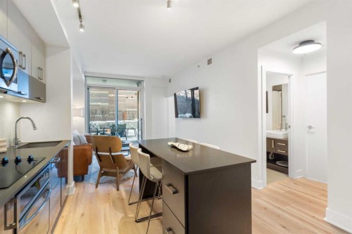 303-550 Riverfront Avenue Se, Calgary, AB - Indoor Photo Showing Kitchen With Upgraded Kitchen