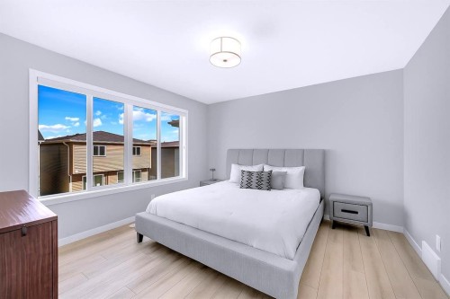 154 Silver Spruce Grove Sw, Calgary, AB - Indoor Photo Showing Bedroom