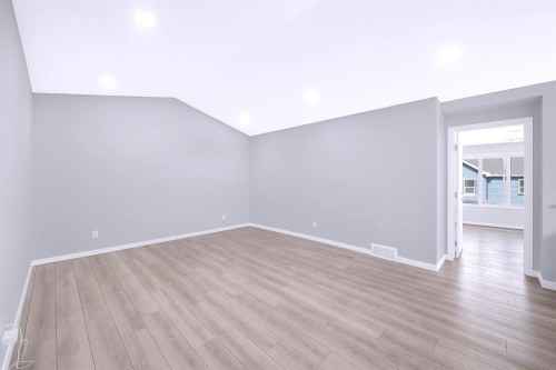 154 Silver Spruce Grove Sw, Calgary, AB - Indoor Photo Showing Other Room