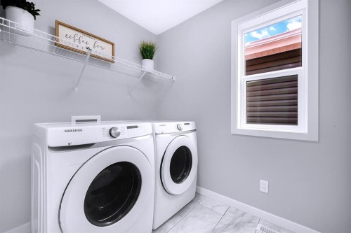 154 Silver Spruce Grove Sw, Calgary, AB - Indoor Photo Showing Laundry Room