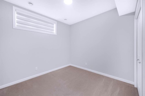 154 Silver Spruce Grove Sw, Calgary, AB - Indoor Photo Showing Other Room