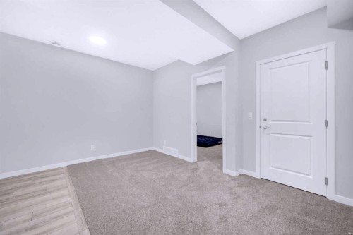 154 Silver Spruce Grove Sw, Calgary, AB - Indoor Photo Showing Other Room
