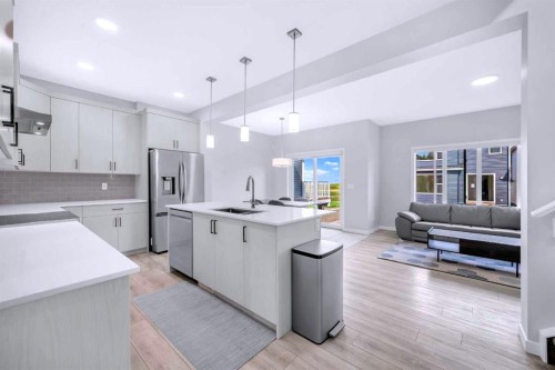 154 Silver Spruce Grove Sw, Calgary, AB - Indoor Photo Showing Kitchen With Stainless Steel Kitchen With Upgraded Kitchen