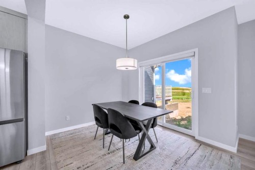 154 Silver Spruce Grove Sw, Calgary, AB - Indoor Photo Showing Dining Room
