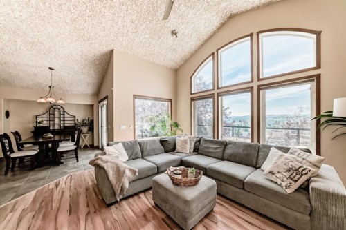 150 Hidden Creek Heights Nw, Calgary, AB - Indoor Photo Showing Living Room