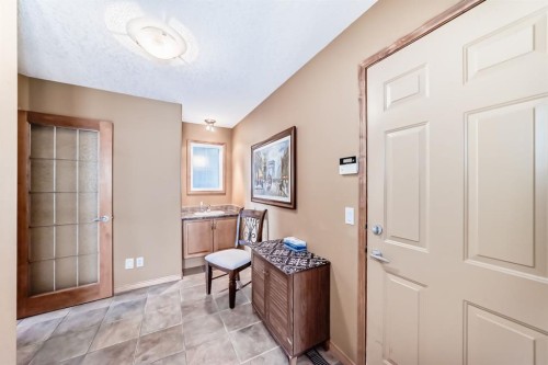 150 Hidden Creek Heights Nw, Calgary, AB - Indoor Photo Showing Other Room