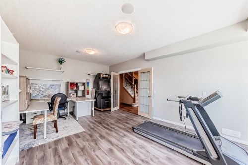 150 Hidden Creek Heights Nw, Calgary, AB - Indoor Photo Showing Gym Room