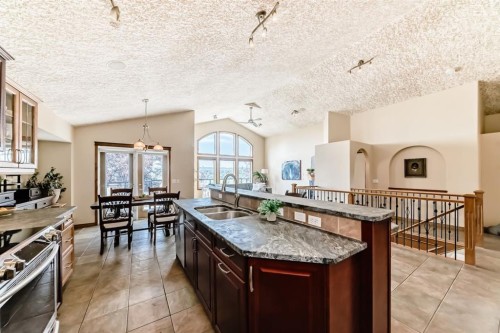150 Hidden Creek Heights Nw, Calgary, AB - Indoor Photo Showing Kitchen With Double Sink