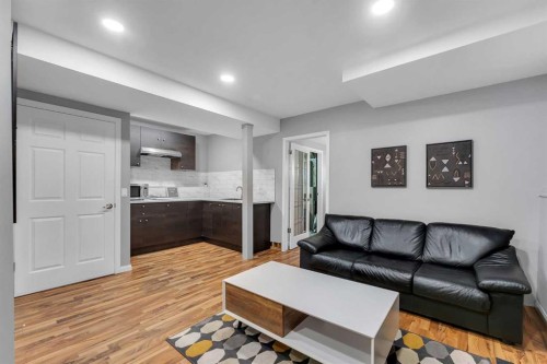 63 Erin Green Way Se, Calgary, AB - Indoor Photo Showing Living Room