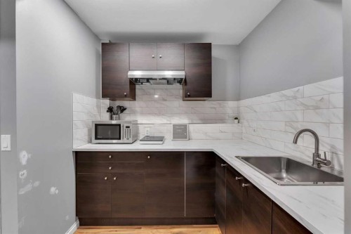 63 Erin Green Way Se, Calgary, AB - Indoor Photo Showing Kitchen