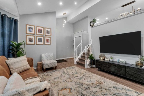 63 Erin Green Way Se, Calgary, AB - Indoor Photo Showing Living Room