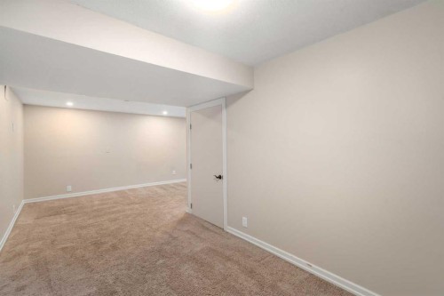 14-2815 Palliser Drive Sw, Calgary, AB - Indoor Photo Showing Other Room