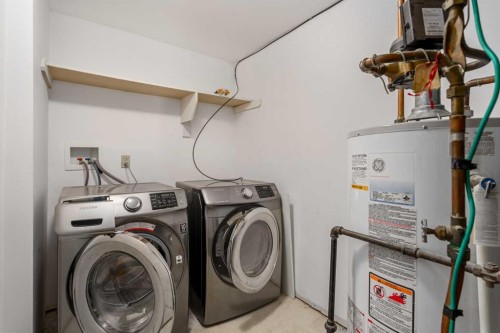 14-2815 Palliser Drive Sw, Calgary, AB - Indoor Photo Showing Laundry Room