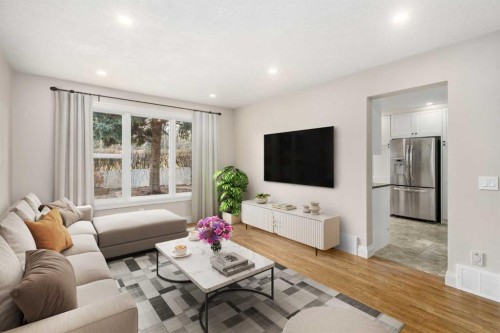 14-2815 Palliser Drive Sw, Calgary, AB - Indoor Photo Showing Living Room