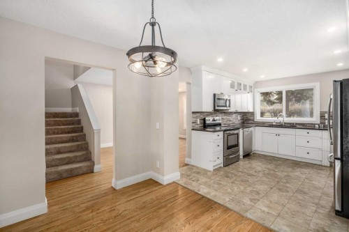 14-2815 Palliser Drive Sw, Calgary, AB - Indoor Photo Showing Kitchen