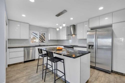 11 Selkirk Drive Sw, Calgary, AB - Indoor Photo Showing Kitchen With Stainless Steel Kitchen With Upgraded Kitchen