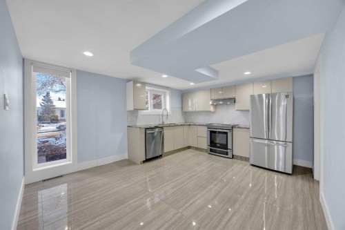 11 Selkirk Drive Sw, Calgary, AB - Indoor Photo Showing Kitchen With Stainless Steel Kitchen
