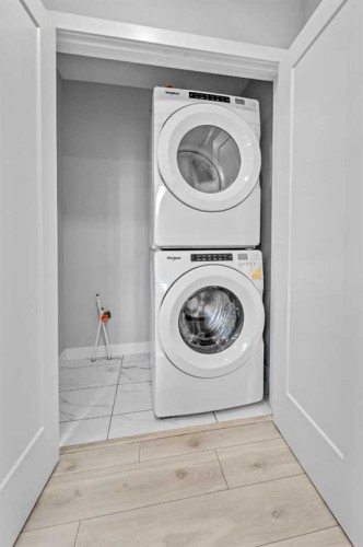 57 Corner Meadows Gate Ne, Calgary, AB - Indoor Photo Showing Laundry Room