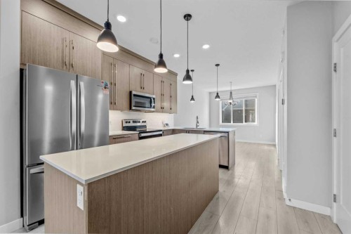 57 Corner Meadows Gate Ne, Calgary, AB - Indoor Photo Showing Kitchen With Upgraded Kitchen